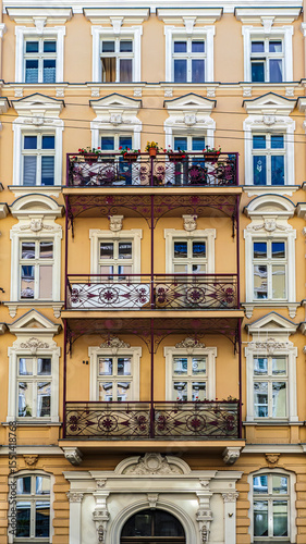 Colorful Historic Apartment Buildings With Ornate Facades and Wrought Iron Balconies