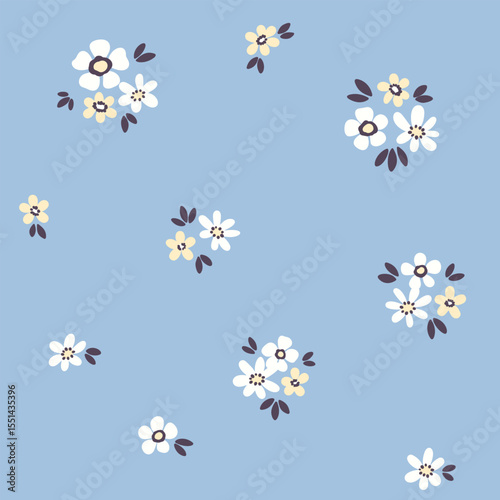 Seamless floral pattern, liberty ditsy print of pretty daisies in mini bouquets on blue. Cute botanical design of small hand drawn flowers, tiny leaves.  Simple textile fashion. Vector illustration.