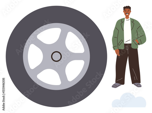 Man in green jacket, smiling near oversized gray car tire, suggesting themes of mechanics, auto industry, safety, travel, or maintenance. Ideal for automotive, repair lifestyle engineering
