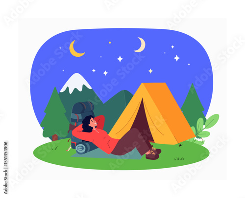 Camper gazes at the starry night sky beside her tent and mountain backdrop