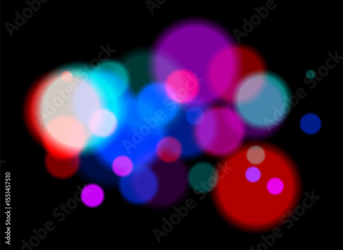 Colorful bokeh. Soft blurred circles in pink, blue, orange tones on dark background create dreamy abstract atmosphere with layered transparency and glowing effect.