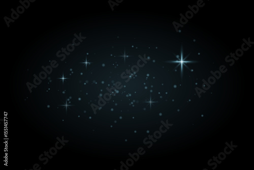 Blue sparkling particles with glowing star flares on dark background. Cold light effect with dreamy fantasy feel.