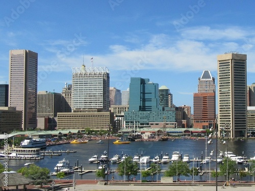 Baltimore harbor with boats and clouds 