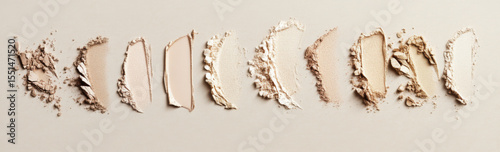 Fluid cosmetics textures featuring spread highlighter and foundation cream