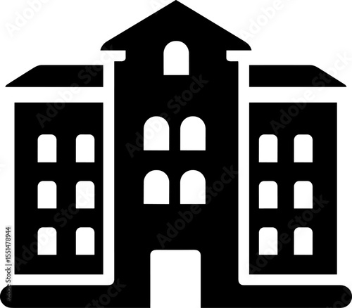 Large black and white building representing school or university institution