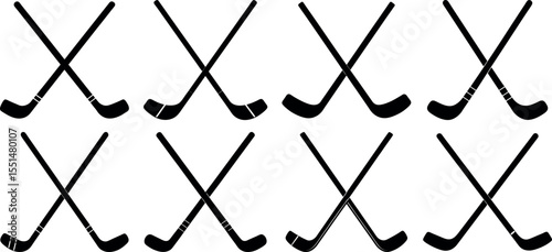 Hockey sticks crossed in a row isolated on white background