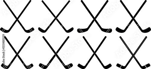 Hockey sticks crossed in a row isolated on white background