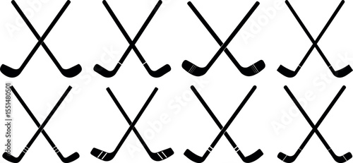 Hockey sticks crossed in a row isolated on white background