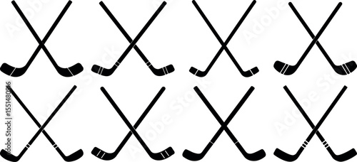 Hockey sticks crossed in a row isolated on white background