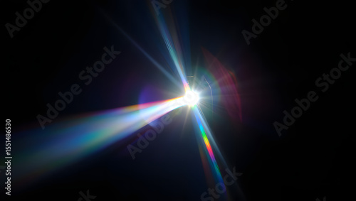 A vibrant lens flare effect creates a streak of light across a dark background 