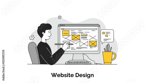 Young male web designer in casual attire working on website layout design at a home office. He is actively creating a website wireframe with a computer at his desk.
