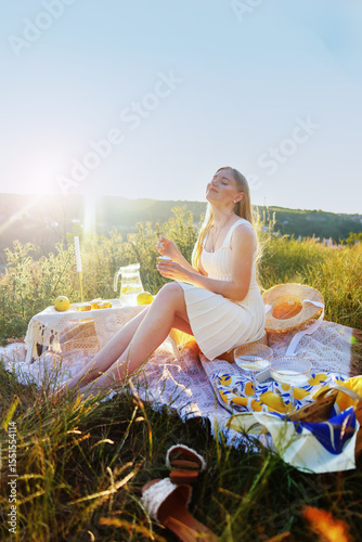 Serene summer picnic with countryside views and natural sunlight