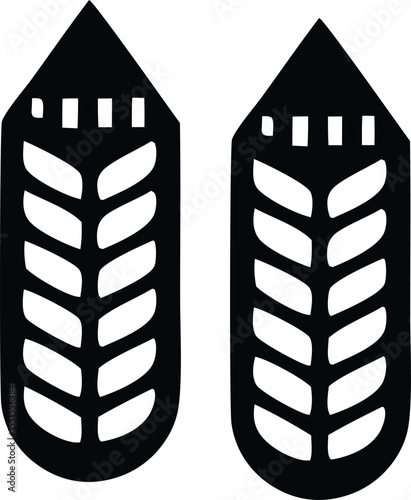Two stylized black wheat stalks with pointed tops and segmented bodies presented as a simple graphic icon on a white background