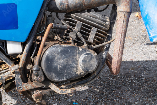 Motorcycle engine is dirty and rusty