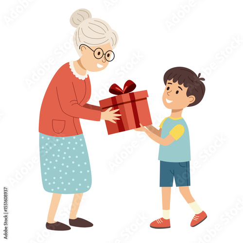 Boy giving a gift to his grandmother. Birthday celebration concept.