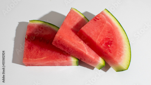 Sunlit watermelon slices evoke summer solstice joy, Sol Invictus glory, vibrant hydration, lycopene-laden refreshment, and picnic nostalgia