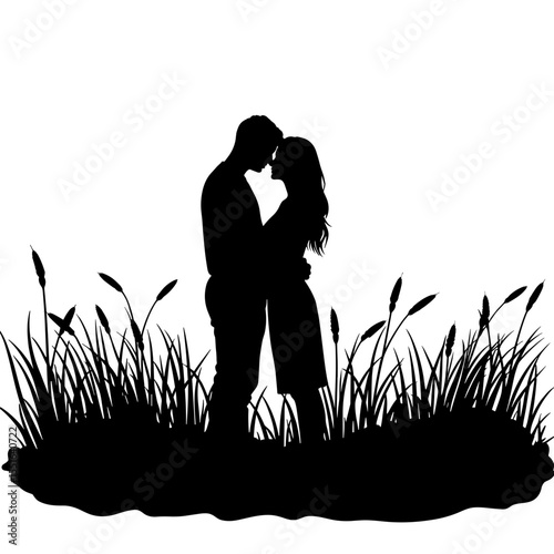 Silhouette of couple embracing in tall grass, black and white romance