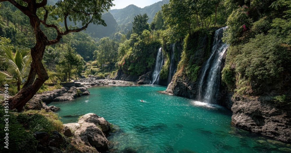 Fototapeta premium Serene Tropical Waterfall Surrounded by Lush Greenery and Majestic Mountains in a Peaceful Natural Setting with Clear Turquoise Water