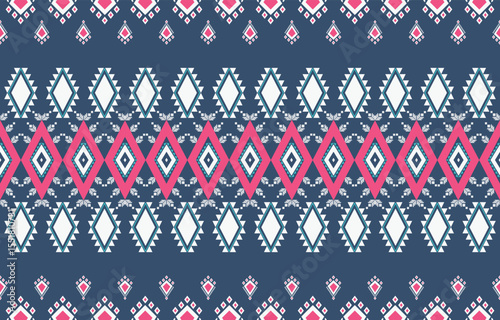 Geometric ethnic Native American tribal patterns, featuring Aztec and Navajo motifs, create a seamless decorative texture. Design for background ,curtain, carpet, clothing, wrapping, Batik.