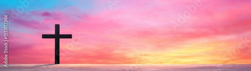 Vibrant Sunset Backdrop with Silhouette Cross in the Foreground Highlighting Serene Atmosphere and Spiritual Essence of a Beautiful Evening
