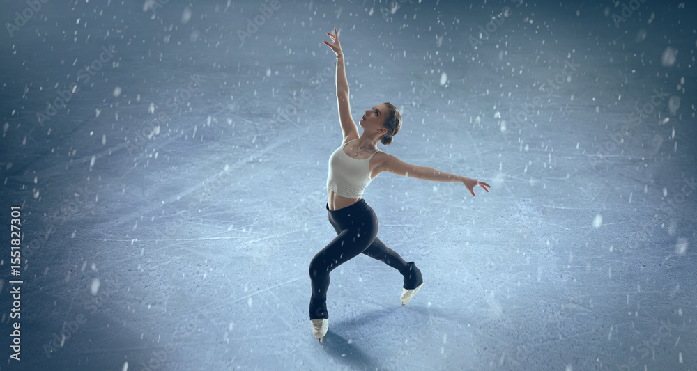 Fototapeta premium Figure skater woman skating on winter skating ice.