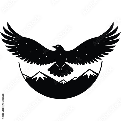Black silhouette of an eagle flying over mountain landscape