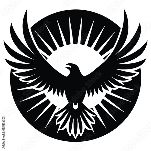 Silhouette of an eagle with wings spread against sunburst disc