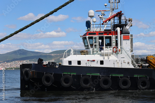 Tug boat ship towing vessel mooring ropes draft and draught marks