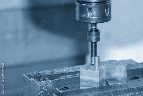 Close up scene the centering the NC milling machine by edge finder tool.
