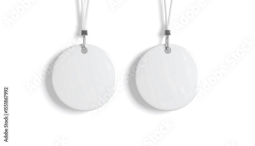 Two white round tags on white background.