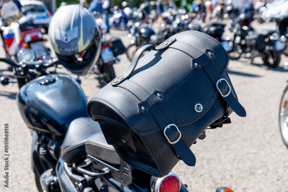 Motorcycle with leather saddlebag at public event Motorcycle with leather saddlebag at public event