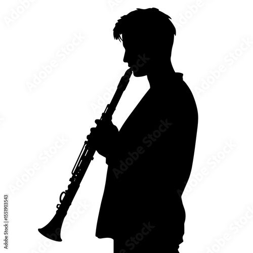 Young man playing clarinet in silhouette against a light background  