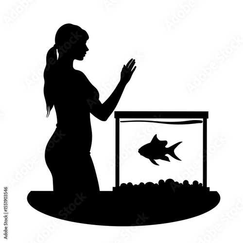 Silhouette of a woman interacting with a fish in an aquarium  