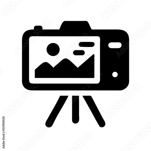 Camera on a tripod taking a picture isolated on white background
