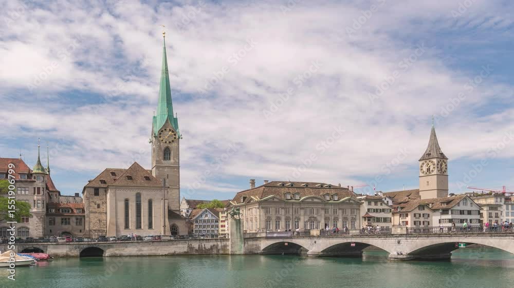 Zurich Switzerland time lapse city skyline at Limmat River with Fraumunster Church Zurich Switzerland time lapse city skyline at Limmat River with Fraumunster Church