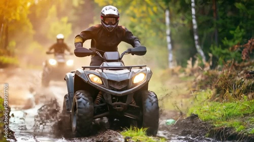 Two people are riding atvs through a muddy forest trail The sun filters through the trees creating a sense of adventure and outdoor fun