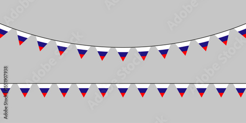 Patriotic bunting flags in red, blue, and white hanging on strings against a neutral gray background — festive, minimal, and versatile.