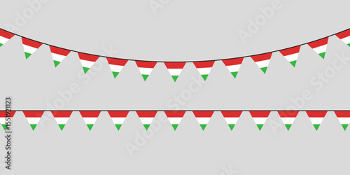 Hungarian flag bunting with red, white, and green pennants hanging in festive rows on a neutral background — perfect for national celebrations.