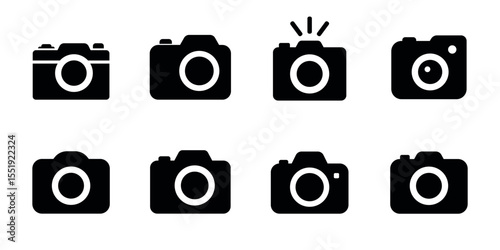 Set of 8 black solid camera icons in flat style. Includes different variations with lens, flash, and shutter details. Ideal for photography, UI design, apps, or multimedia interfaces.