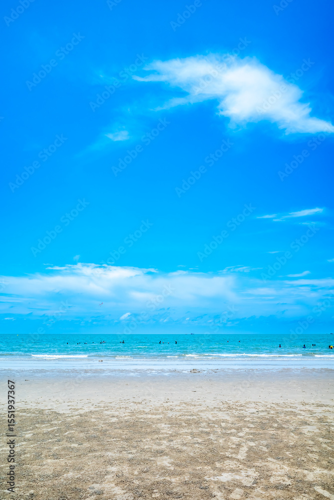 Obraz premium Turquoise sea, white sand beach and sunny day under cloudy clear blue sky, summer in Thailand