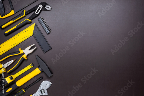 Set of hand tools on a dark background