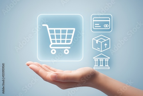 Hand Holding Digital Shopping Cart Icon with Credit Card Package and Bank Symbols Light Blue Background 1