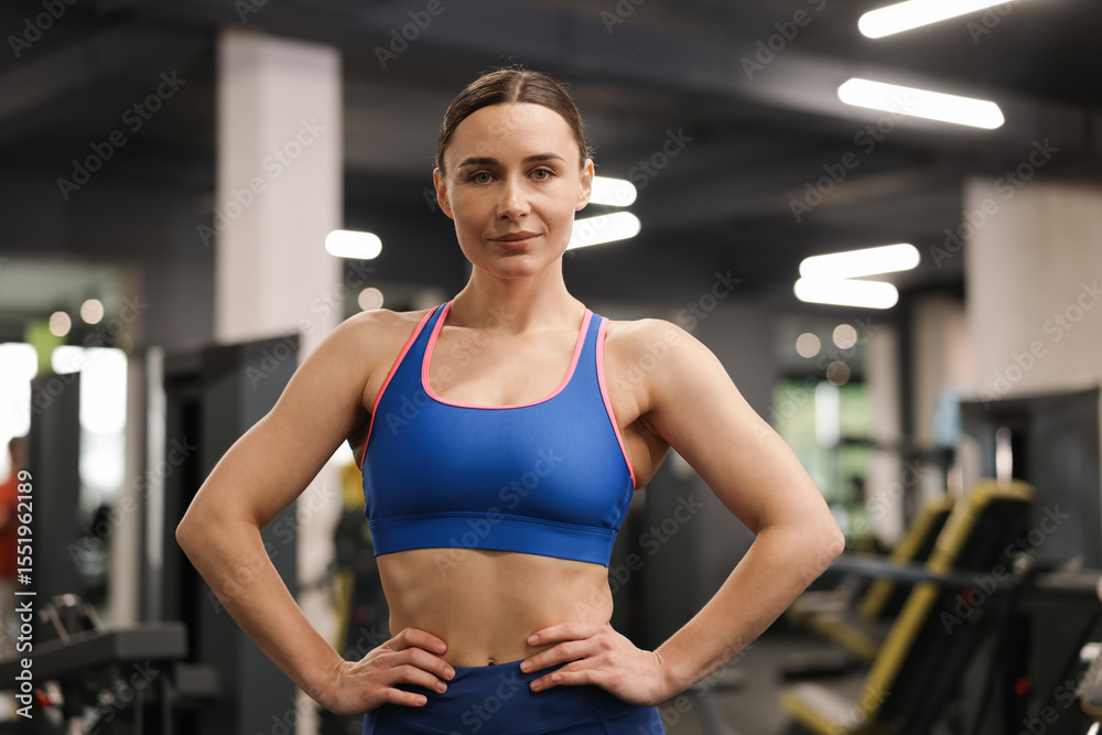 Fototapeta premium Portrait of professional personal trainer in gym