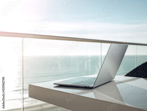 Laptop on Balcony Table with Ocean View