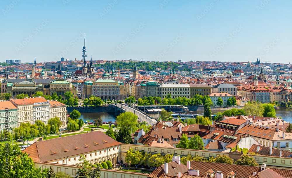 Fototapeta premium A view from the castle complex towards the Manes bridge over Vltava river in Prague in springtime