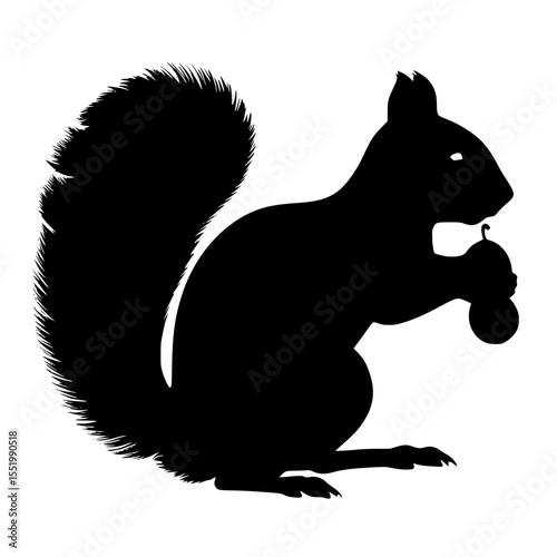 Silhouette of a squirrel holding an acorn