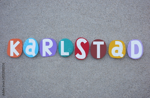 Karlstad, Sweden, seat of Karlstad Municipality, the capital of Värmland County, and the largest city in the province Värmland in Sweden. Souvenir composed with multi colored hand painted stone letter