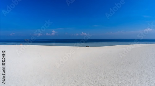 Fototapeta Naklejka Na Ścianę i Meble -  Pristine white sand beach meets azure ocean