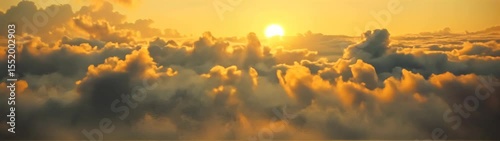 View of a sunset over a cloud filled sky