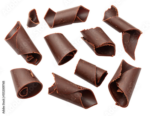 Chocolate curls for dessert decoration and delight. photo